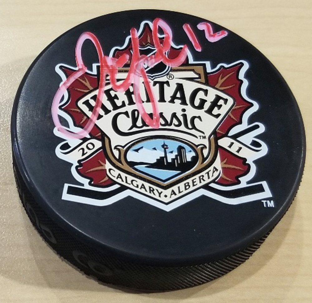 Jarome Iginla Calgary Flames Autographed 2011 Heritage Classic Hockey Puck *Autograph Slightly Faded*