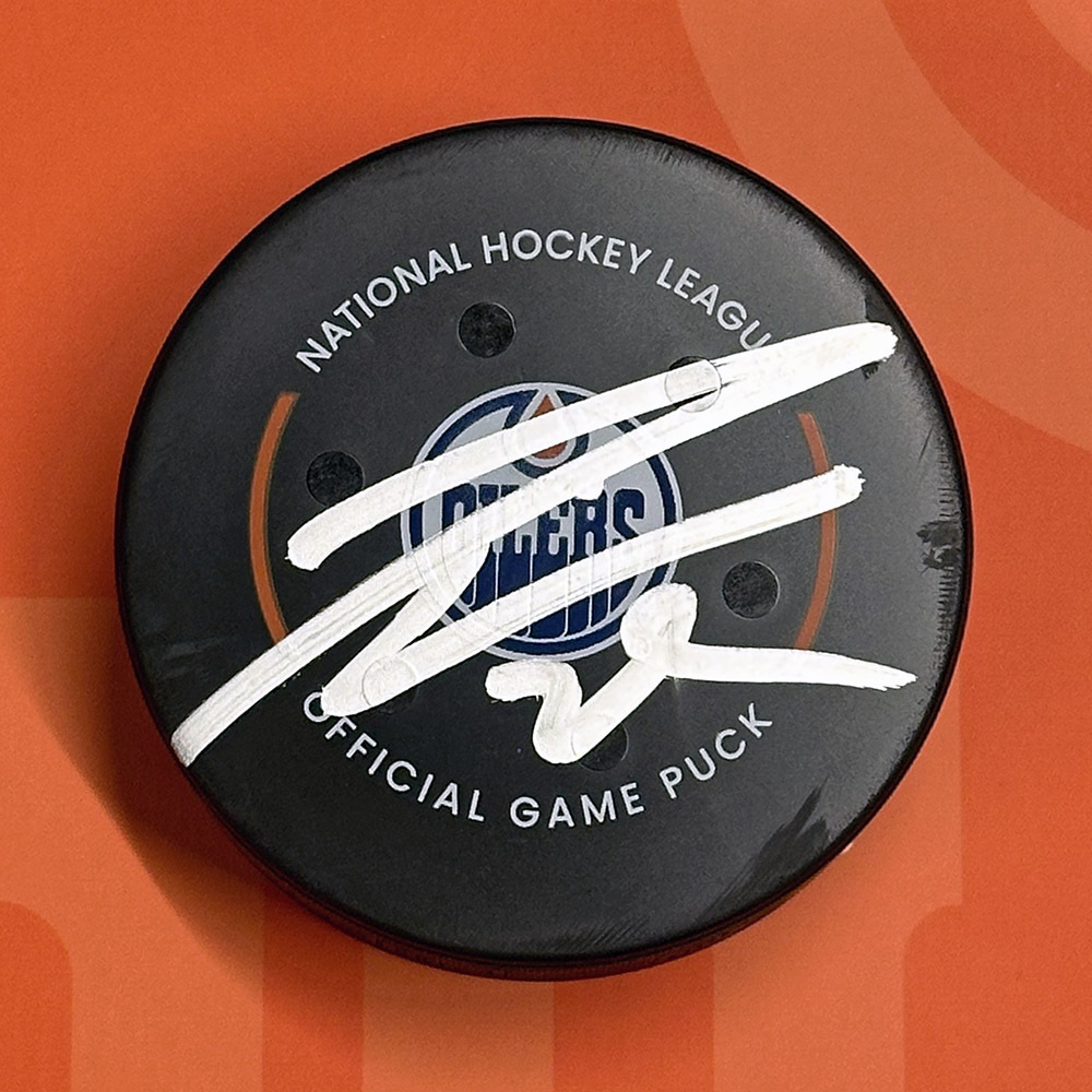 Leon Draisaitl #29 - Autographed Edmonton Oilers Goal Puck Scored On January 23, 2025 vs. Vancouver Canucks (35th of Season & 155th Power Play Goal Of Career)