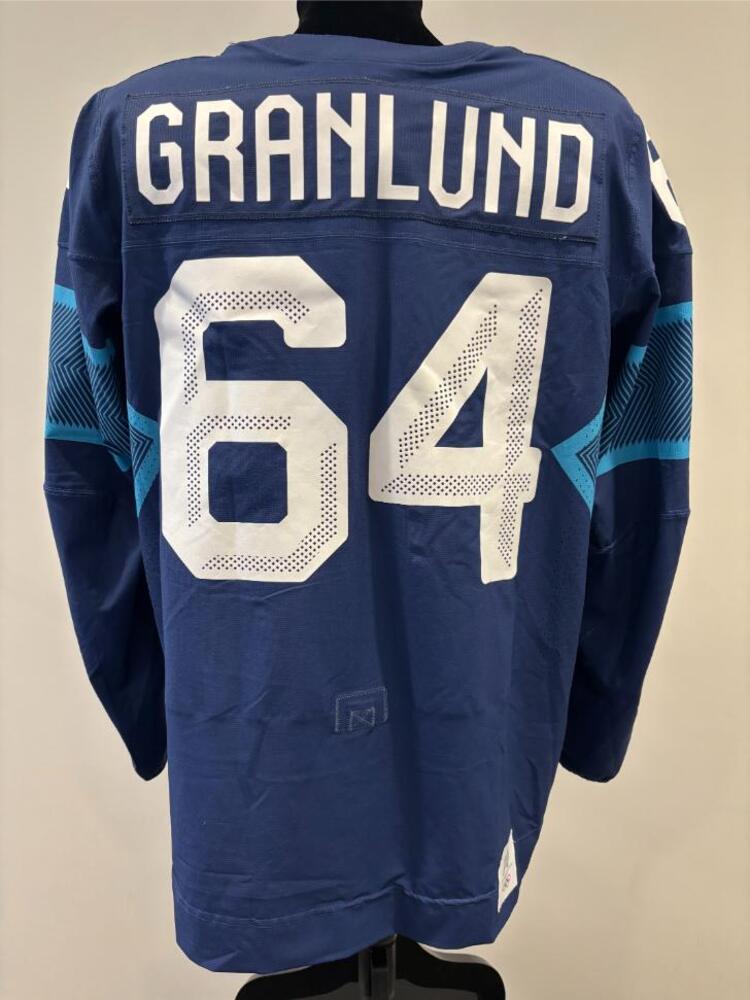 Mikael Granlund Finland Game-Used Blue Jersey worn v. Sweden on February 13, 2026, as a part of the 2026 Milano Cortina Winter Games.