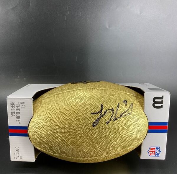 NFL - Jaguars Logan Cooke Signed Gold Composite Football