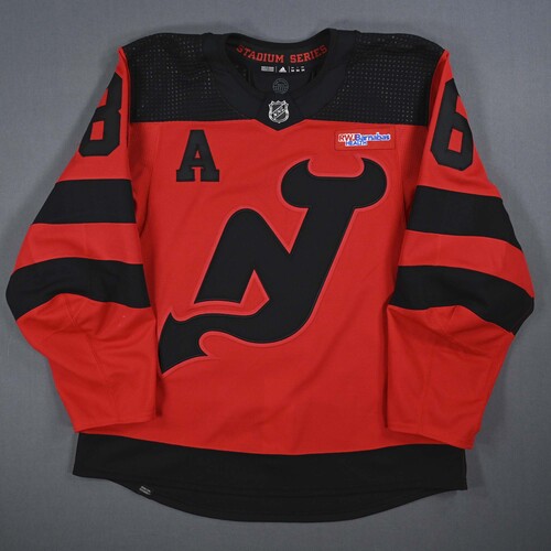 Image of Hughes, Jack<br>Red w/A - Stadium Series Style - Mar. 19, 2024<br>New Jersey Devils<br>2023-24<br>#86