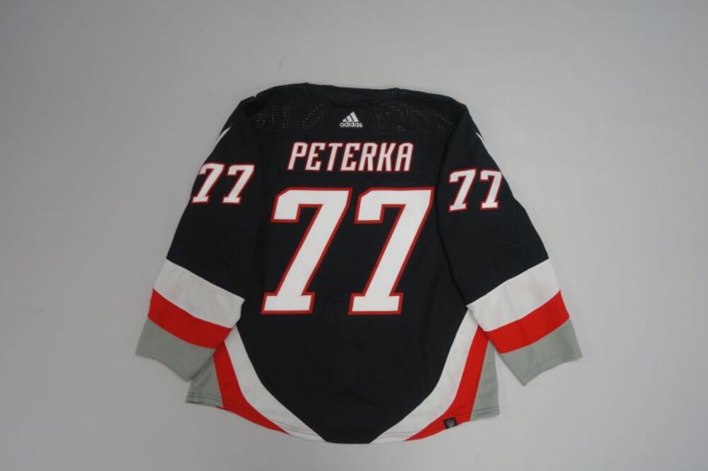 jj-peterka-2023-24-jeff-skinner-s-1000th-game-jersey-issued-for-warm
