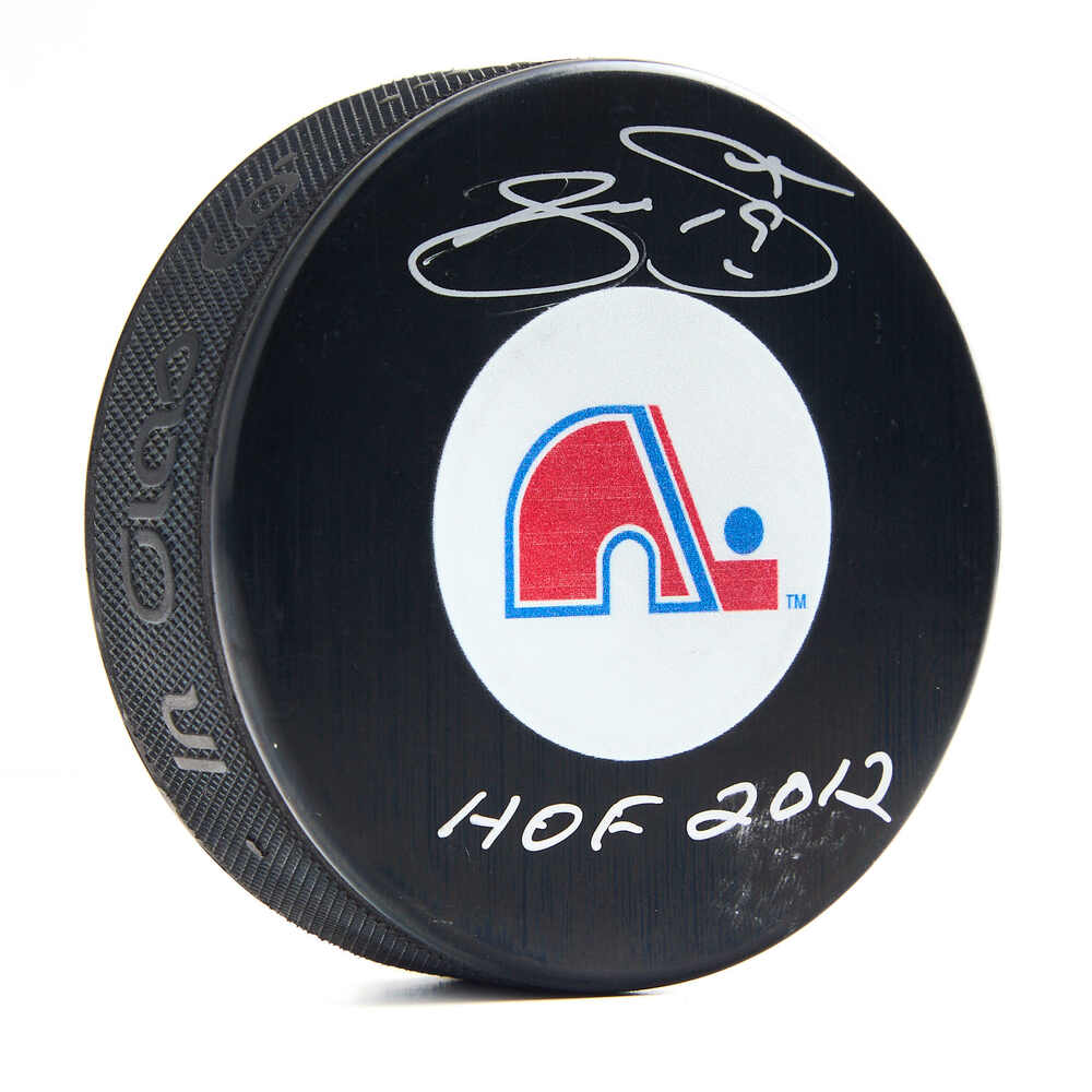 Joe Sakic Autographed Quebec Nordiques Retro Logo Puck with HOF Note