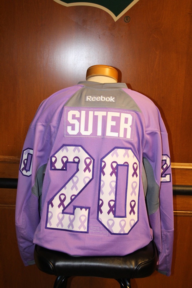 Mn wild 20 ryan suter signed player worn hockey fights cancer wild