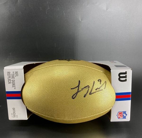 NFL - Jaguars Logan Cooke Signed Gold Composite Football