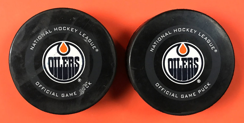 Brandon Saad 20 & Adam Boqvist 27 Chicago Blackhawks Goal Pucks