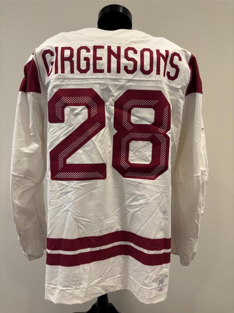 Zemgus Girgensons Latvia Game-Used White Jersey worn v. Denmark on February 15, 2026, as a part of the 2026 Milano Cortina Winter Games.