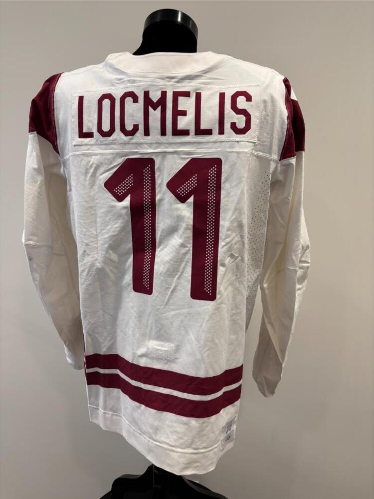 Dans Locmelis Latvia Game-Used White Jersey worn v. Denmark on February 15, 2026, as a part of the 2026 Milano Cortina Winter Games.