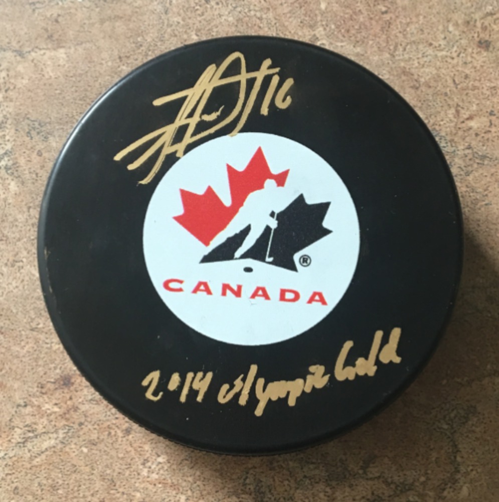 Jonathan Toews - Signed 2014 Team Canada Puck Inscribed 