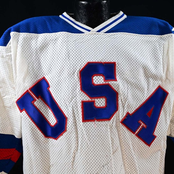 Close-Up of USA logo on Front of Ken Morrow White Team USA ‘Miracle on Ice’ Game-Worn Photo-Matched Jersey.