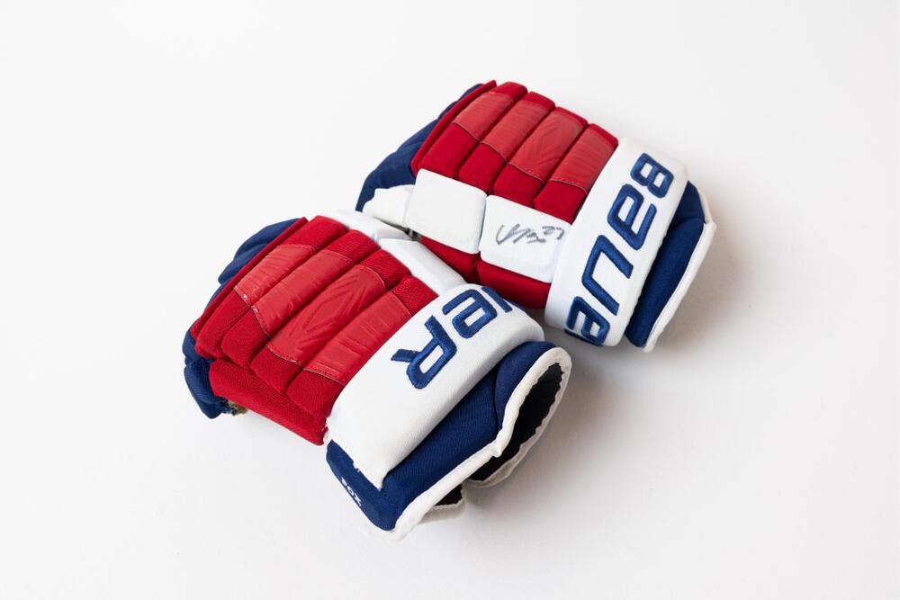 Signed and Game-Used Bauer Gloves by #23 Adam Fox - New York Rangers