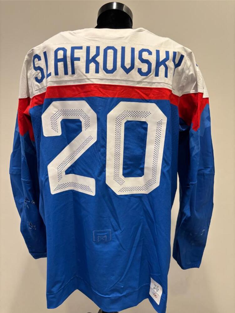 Juraj Slafkovsky Slovakia Game-Used Blue Jersey worn v. Germany on February 18, 2026, as a part of the 2026 Milano Cortina Winter Games.