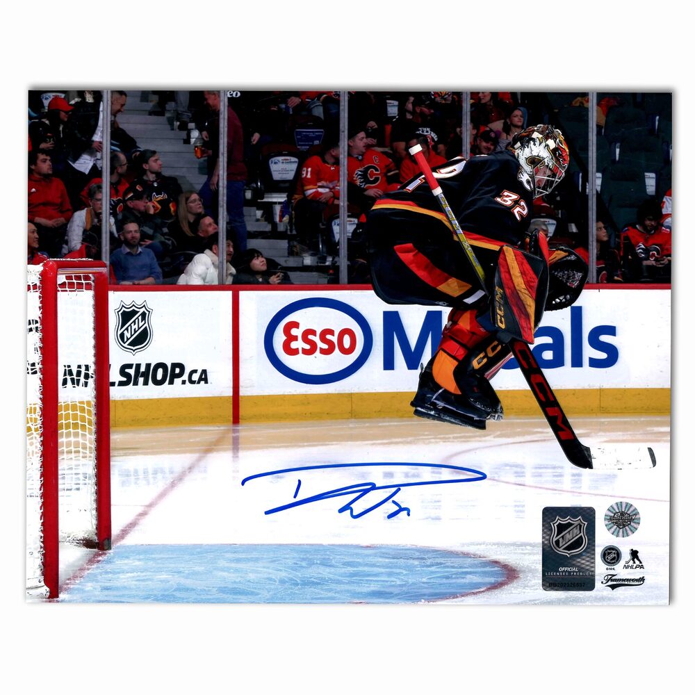 Dustin Wolf Autographed Calgary Flames Alternate Jumping Horizontal 8x10 Photo