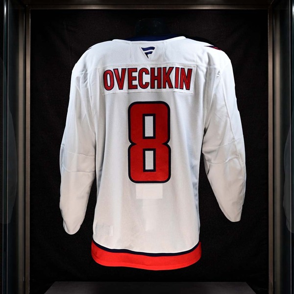 Back of Alex Ovechkin White Washington Capitals Game-Worn Jersey Photo-Matched to Postgame Celebration After NHL Record-Breaking Goal.
