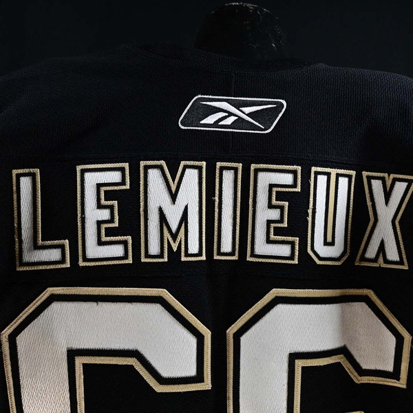 Close-Up of Nameplate on Back of Mario Lemieux Black Set 1 Pittsburgh Penguins Game-Worn Photo-Matched Jersey.
